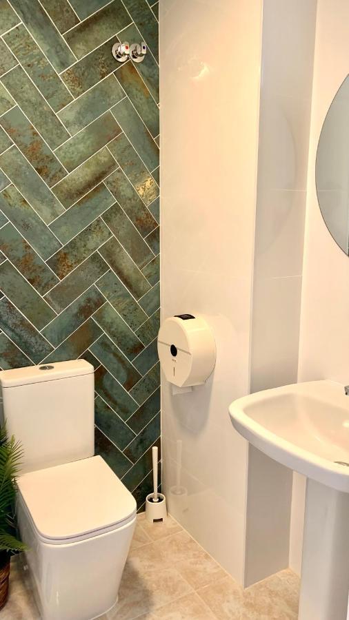 Hostal Sango Sierra De Las Nieves Alozaina Bagian luar foto