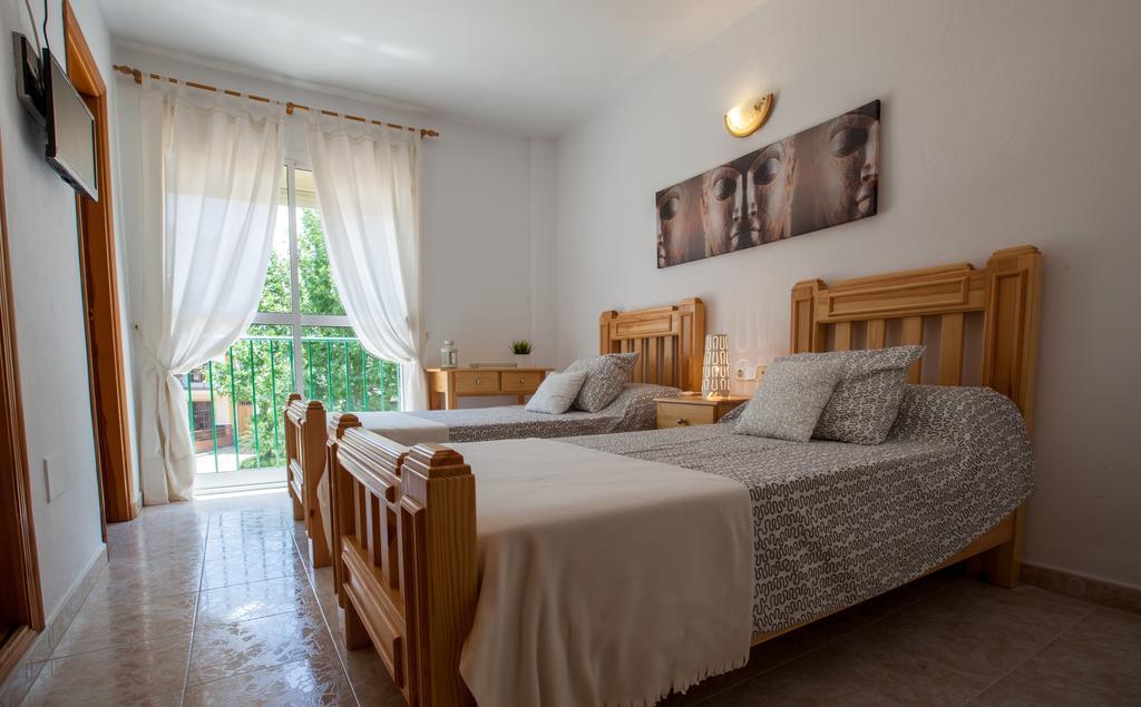 Hostal Sango Sierra De Las Nieves Alozaina Bagian luar foto