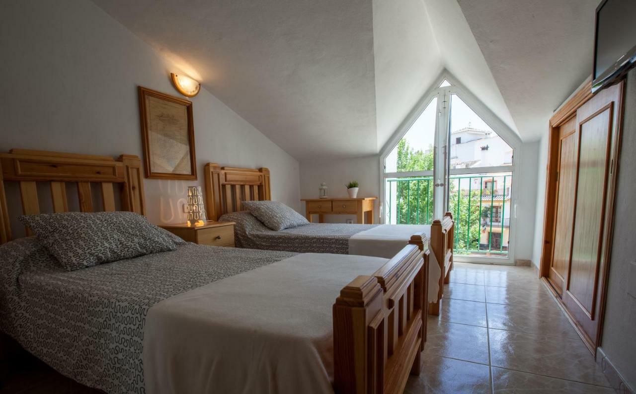 Hostal Sango Sierra De Las Nieves Alozaina Bagian luar foto